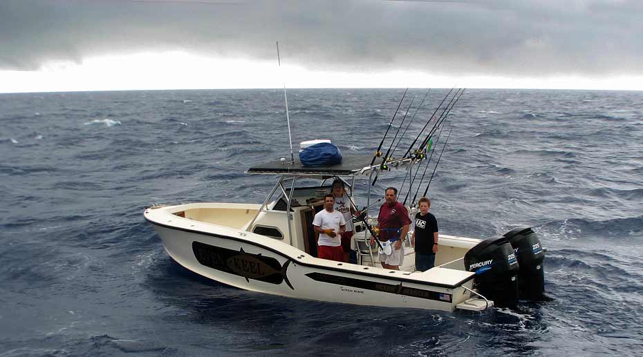 31 center console Ocean Master fishing well offshore in the Gulf of Mexico