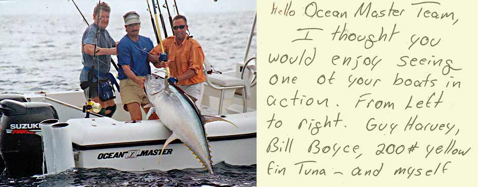 Guy Harvey fishing on an Ocean Master 27 Center Console - landing large tuna